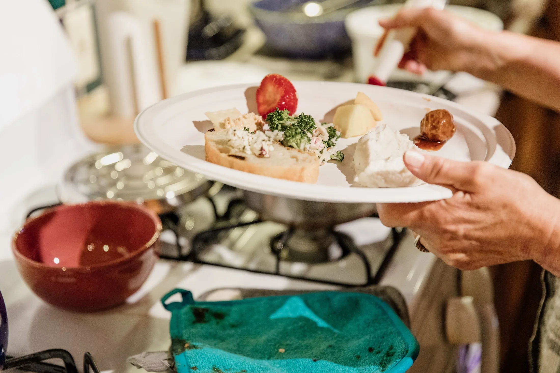 A plated dish being prepared in Dragonwood's catering kitchen