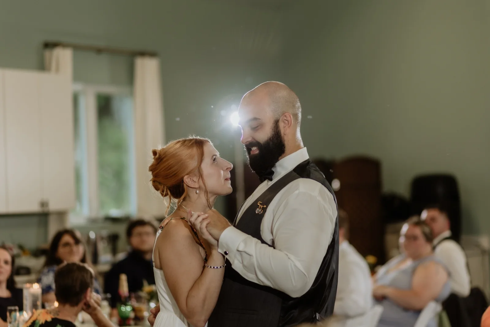 A couple sharing their first dance at Dragonwood