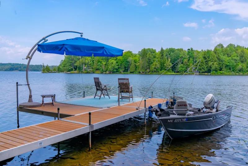Dock chairs by the water at Dragonwood